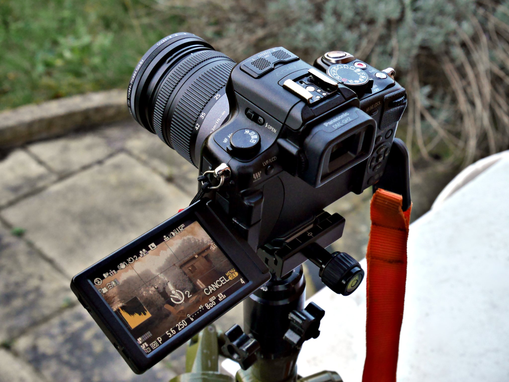 Elderly "full-spectrum-converted" Lumix DMC GH2, c/w a bog-standard Lumix 14-42mm "kit lens" c/w step-up ring and 58mm Fourth Eye variable IR filter, mounted on a 30 year-old British Benbo Trekker tripod, with an "Arca Chinese" quick release.