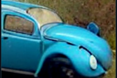 craiyon_000055_Jeremy_Clarkson_crashes_blue_Volkswagen_Beetle_br_