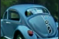 craiyon_000100_Jeremy_Clarkson_crashes_blue_Volkswagen_Beetle_br_