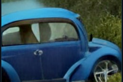 craiyon_000302_Jeremy_Clarkson_crashes_blue_Volkswagen_br_