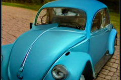 craiyon_000449_5_door_blue_Volkswagen_beetle_br_