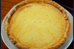 craiyon_000755_Ian_Hislop_custard_pie_br_