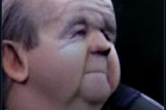 craiyon_001000_Ian_Hislop_hit_in_the_face_with_a_custard_pie_br_