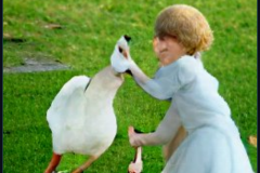 craiyon_001935_Kind_angel_feeds_a_hungry_goose_br_