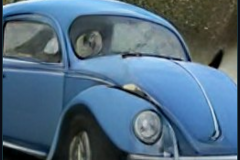 craiyon_235910_Jeremy_Clarkson_crashes_blue_Volkswagen_Beetle_br_
