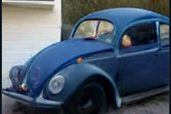 craiyon_235915_Jeremy_Clarkson_crashes_blue_Volkswagen_Beetle_br_