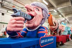 20170625-theresa-may-brexit-gun-in-mouth