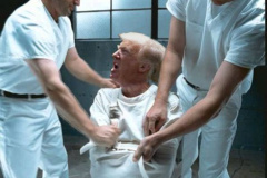 20250402-trump-straightjacket